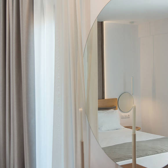 Nami Hotel Suites Deluxe Room mirror