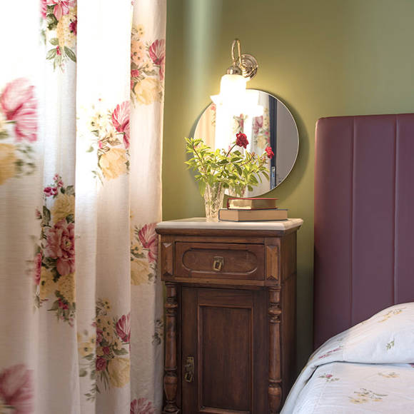 Nami Hotel Suites Artist Room decorated bedside table