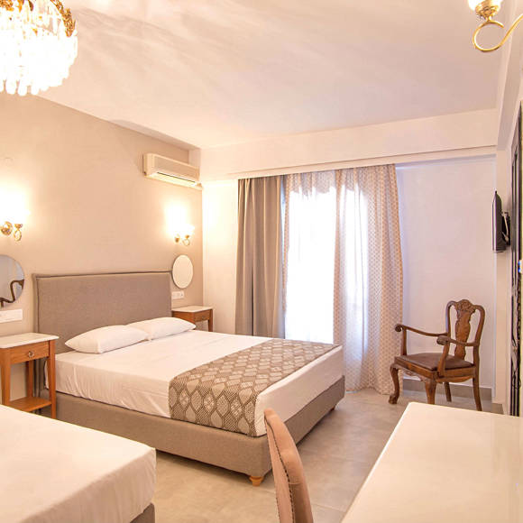 Nami Hotel Suites Double Superior Room bedroom with two double beds