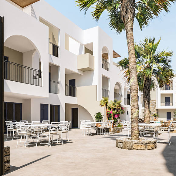 Nami Hotel Suites outdoor area with tables and chairs