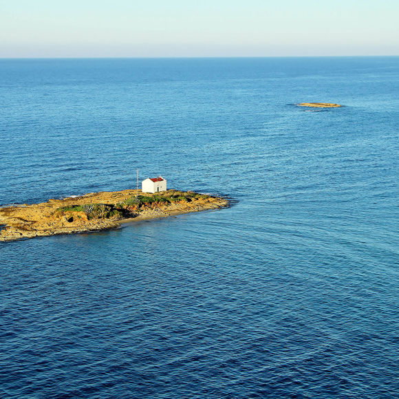 The island of Afentis Christos of Malia and the Church of the Transfiguration of the Savior