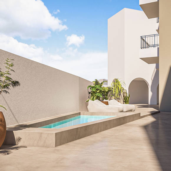 Nami Hotel Suites small pool with sunbeds and flower pots