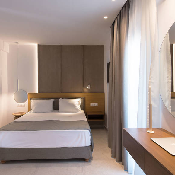 Nami Hotel Suites Deluxe Room bedroom lit up