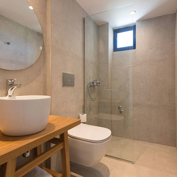 Nami Hotel Suites Suite bathroom and amenities