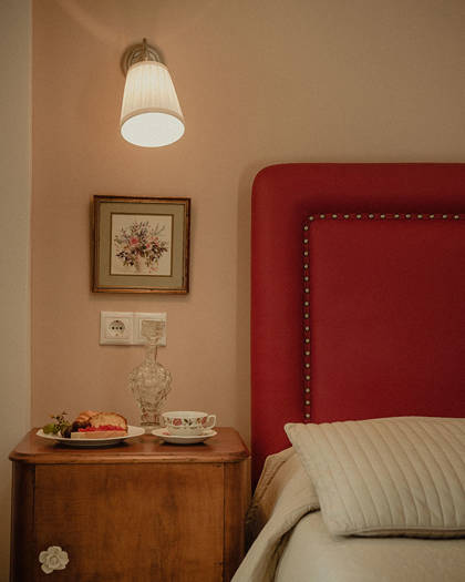 Nami Hotel Suites Artist Room decorated bedside table