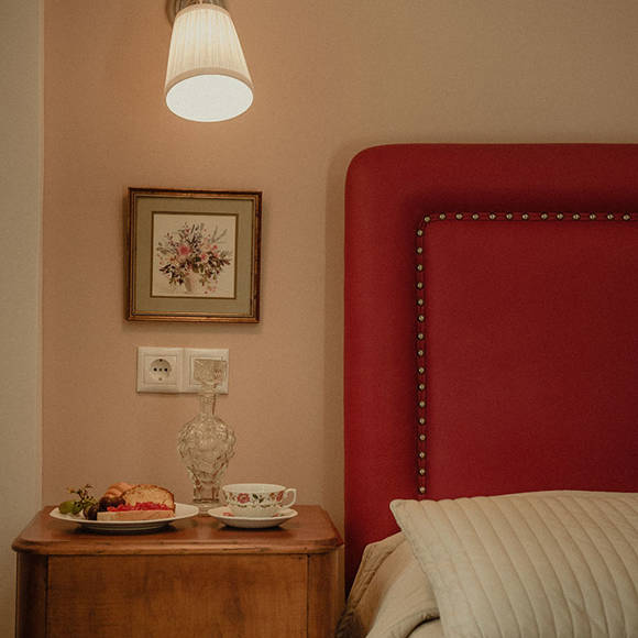 Nami Hotel Suites Artist Room decorated bedside table